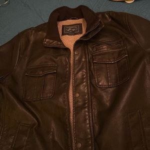 Men’s LG Bass & Co black jacket with faux fur lining.